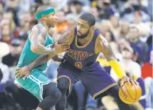  ?? Ron Schwane / Associated Press 2016 ?? Isaiah Thomas (left) and Kyrie Irving will switch uniforms when Boston plays Cleveland on Oct. 17 to open the season.