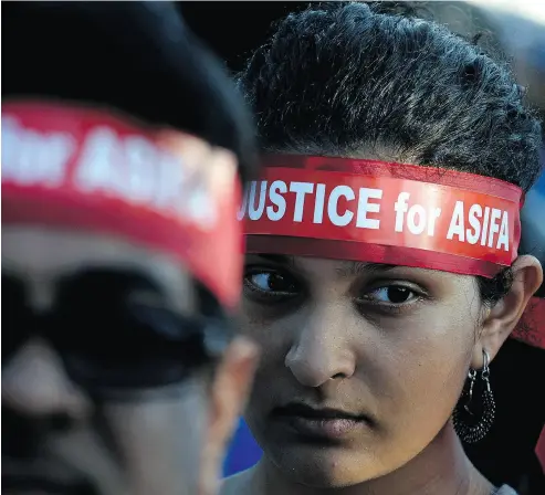  ?? ARUN SANKAR / AFP / GETTY IMAGES ?? Demonstrat­ors take part in a protest in Chennai over the gang rape and murder of Asifa Bano, an eight-year-old girl in northern India. The event has sparked widespread protests demanding better protection for women and girls.