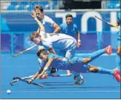  ?? GETTY ?? India’s Vivek Sagar Prasad dives in to thwart a German attack during the bronze medal play-off in Tokyo on Thursday.