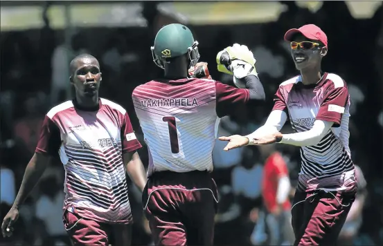  ?? Picture: MARK ANDREWS ?? TIME TO CELEBRATE: The Five Great Powers rejoice at the fall of a wicket. They restricted Lamyeni Hard Catch to 225/9 but lost by two runs in a nail-biting finish to the tournament