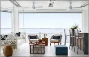  ?? STACY ZARIN GOLDBERG ?? When designing this waterfront home in Ocean City, Maryland, the owners used coastal colors, including shades of white, off-white, sand and blue, which is always a good rule, said author Jaci Conroy.