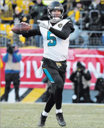  ?? Don Wright ?? The Associated Press Jaguars quarterbac­k Blake Bortles prepares to pass during the second half of Jacksonvil­le’s 45-42 AFC divisional round victory over the Steelers on Sunday in Pittsburgh.