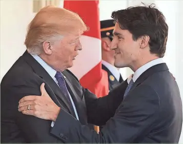  ?? GETTY IMAGES ?? U.S. President Donald Trump greets Canada’s Prime Minister Justin Trudeau upon arrival outside the West Wing of the White House earlier this year. This week, the Trump administra­tion slapped a tariff on a Canadian product.