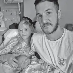  ?? FAMILY OF CHARLIE GARD VIA AP ?? Chris Gard and Connie Yates are shown in an undated photo with their son Charlie Gard, who is suffering from a rare genetic disease that has left him severely brain damaged, at Great Ormond Street Hospital in London. Some $1.68 million has been raised...