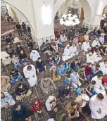  ??  ?? Muslim worshipper­s gather despite the coronaviru­s for the prayers of Eid’l Fitr the Muslim holiday which starts at the conclusion of Ramadan, in Syria yesterday.