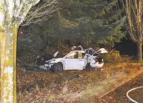  ?? Corvallis Police Department 2020 ?? Dylan Milota crashed his Tesla S vehicle in November after losing control while driving about 100 mph in Corvallis, Ore. He survived the crash.