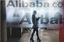  ?? Reuters ?? Alibaba headquarte­rs on the outskirts of Hangzhou. Alibaba is vying for supremacy with the Tencent-backed start-up, Meituan Dianping, in a local services industry.