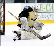  ?? GEORGE SPITERI — FOR MEDIANEWS GROUP ?? North Oakland goaltender Dominic Geric turns away a shot while shorthande­d late in the second period against Grosse Pointe North during the MAC vs. OAA Showcase game played at Mt. Clemens Ice Arena on Monday.