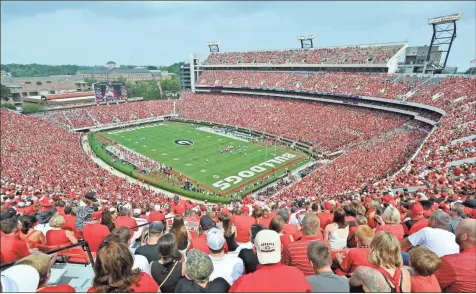  ?? AP-John Amis ?? Georgia fans watch the season opening game at Sanford Stadium in Athens in this file photo.