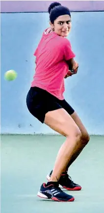  ??  ?? Humera Shaik of Telangana lines up a shot during her women’s singles first round match against Pratibha P. Narayan at the Fenesta Open National Tennis Championsh­ip in New Delhi on Tuesday. Humera won 7-6 (6), 0-6, 6-3.