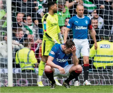  ?? Photograph: SNS ?? Danny Wilson, Wes Foderingha­m and Kenny Miller look dejected at Ibrox