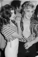  ?? Photograph: Michael Putland/ Getty Images ?? Suzi with Mick Ronson, London, September 1974.