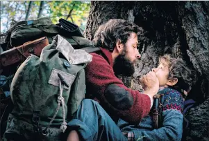  ?? AP PHOTO ?? This image released by Paramount Pictures shows John Krasinski, left, and Noah Jupe in a scene from “A Quiet Place.”
