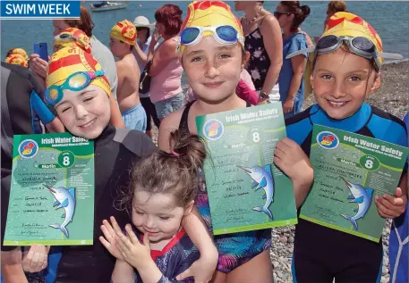  ??  ?? Izzy and Mia Dunne with Lucy Dempsey and Alisha Chatterjee at Wicklow Swim Week at Wicklow Harbour.
