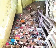  ?? ?? The staircase at Mega Mall along Jalan Yong Muk Chai has become a rubbish dump.