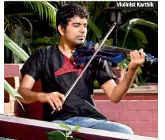  ??  ?? Violinist Karthik