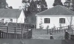  ??  ?? Mystery remains: a Garda officer in the grounds of Ballymany Stud Farm, Newbridge, Co Kildare where Shergar was taken from by the IRA