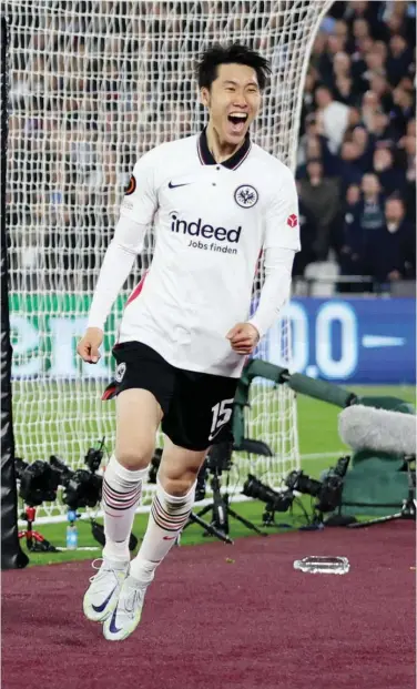 ?? Agence France-presse ?? Eintracht Frankfurt’s Daichi Kamada celebrates after scoring against West Ham United during their Europa League semi-final first leg match in London.
