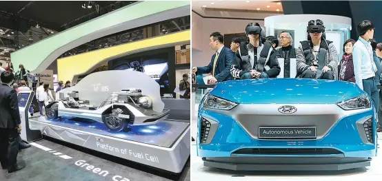  ?? FOTO ?? La marca de autopartes Mobis presentó un novedoso prototipo de auto eléctrico con batería de hidrógeno, mientras la coreana Hyundai dio a conocer su vehículo autónomo, que los asistentes al Seoul Motor Show pudieron manipular.