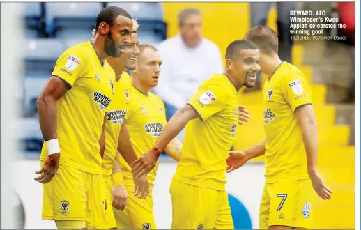  ?? PICTURES: PSI/Simon Davies ?? REWARD: AFC Wimbledon’s Kwesi Appiah celebrates the winning goal