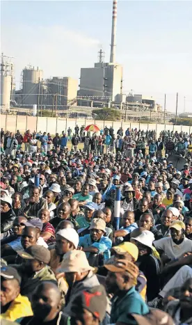  ?? Picture: SIMPHIWE NKWALI ?? HARD TIMES: Striking platinum mineworker­s attend an Amcu rally. The 70 000 workers have lost R6.5-billion in wages as the showdown drags on