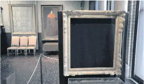  ??  ?? Empty frames that contained the paintings remain on display at the Isabella Stewart Gardner Museum in Boston.