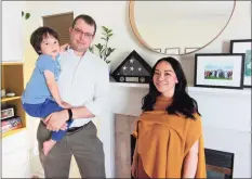  ?? Christian Abraham / Hearst Connecticu­t Media ?? City Rep. Ben Lee, D-15, his son Matthew, 3, and wife Emily at their home in Stamford on Saturday. Lee served in the U.S. Army and worked closely with a translator while in Afghanista­n. He recently helped the translator's family flee the country on one of the last military flights out.