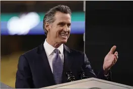  ?? MARK J. TERRILL — THE ASSOCIATED PRESS ?? Gov. Gavin Newsom delivers his State of the State address from Dodger Stadium in Los Angeles on Tuesday.