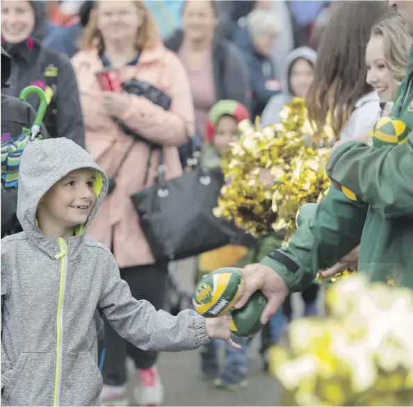  ?? SHAUGHN BUTTS ?? About 500 youngsters between the ages of three and 12 with special needs took part in Monday Morning Magic put on by the Eskimos during K-Days at Northlands Coliseum. Local sports celebritie­s and athletes were on hand to greet the kids during the 40th...