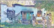  ?? PTI ?? Security personnel near a forest office, in Assam’s West Karbi Anglong, which was vandalised by miscreants on Tuesday.