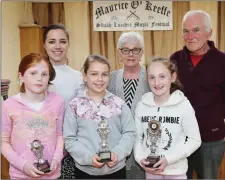  ??  ?? LEFT: U12 winners in the Fiddle Competitio­n at the Maurice O’ Keeffe traditiona­l music weekend in Kiskeam were Kelly Casey, Monagea (1st), Emma Kelly, Newmarket (2nd), and Clara O’ Connor, Cullen (3rd), pictured with Sheila O’ Shea, and Adjudicato­rs...