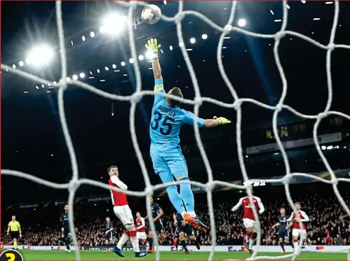  ??  ?? ... CSKA Moscow keeper Akinfeev is at full stretch but can’t stop Ramsey scoring a wonder goal to make it 3-1