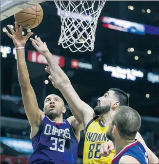  ?? Ringo H.W. Chiu Associated Press ?? NICOLAS BATUM had all of his season-high 32 points in the second half against Goga Bitadze and the Pacers, the fourth player with that many in a half this season. “Don’t get used to it,” he said.