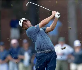  ?? — AFP ?? Kevin Kisner plays a shot on the fifth hole in the third round of the 2017 PGA Championsh­ip at Quail Hollow Club in Charlotte, North Carolina, on Saturday.