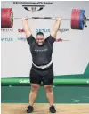  ?? PHOTO: GETTY IMAGES ?? David Liti on his way to winning a gold medal at the Commonweal­th Games on the Gold Coast last night.