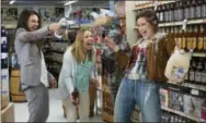  ?? MICHELE K. SHORT/STX PRODUCTION­S VIA AP ?? This image released by STX Production­s shows, from left, Mila Kunis, Kristen Bell and Kathryn Hahn in a scene from “Bad Moms.”