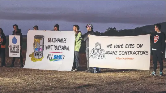  ??  ?? HIGHWAY PROTEST: Frontline Action on Coal protesters blocked off BMD workers' access to the Haughton River Floodplain upgrade yesterday.