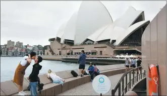  ?? EDGAR SU / REUTERS ?? The Sydney Opera House in Australia is a popular tourist destinatio­n, attracting a great number of visitors from China.