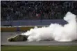  ?? JOHN LOCHER — THE ASSOCIATED PRESS ?? Joey Logano does a burnout after winning the Monster Energy Cup Series race March 3 at Las Vegas Motor Speedway.