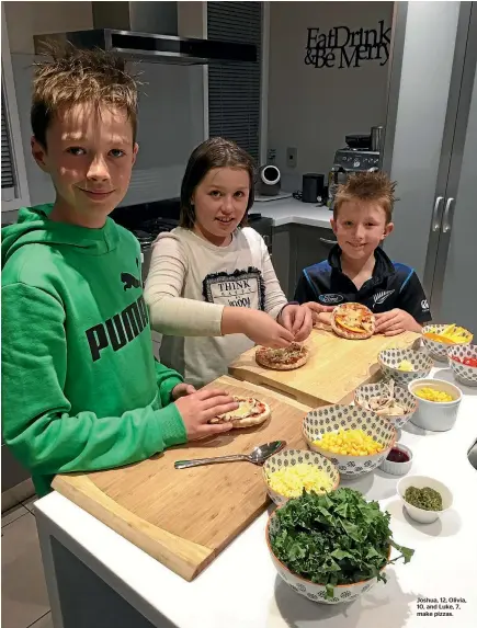  ??  ?? Joshua, 12, Olivia, 10, and Luke, 7, make pizzas.