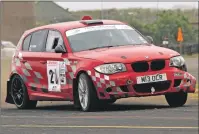  ??  ?? Fergus Gray and Eoghan Anderson in their BMW 130i.