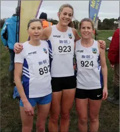  ??  ?? Jackie Carthy (second), Fiona Kehoe (first) and Sharon Cloney (third), all from Kilmore AC, after the women’s race in Kilrane.