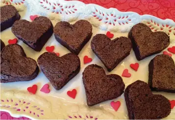  ?? GWYNN GALVIN / SWIRLSOFFL­AVOR.COM ?? Heart-shaped brownies are a perfect Valentine’s Day treat.
