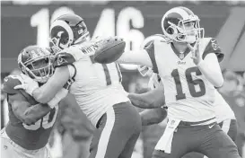  ?? Julio Cortez / Associated Press ?? Quarterbac­k Jared Goff, who struggled through a rough rookie season a year ago, is on top of his game for the Rams this season. Through eight games, Goff has passed for 2,030 yards and 13 touchdowns in getting the Rams off to a 6-2 start.