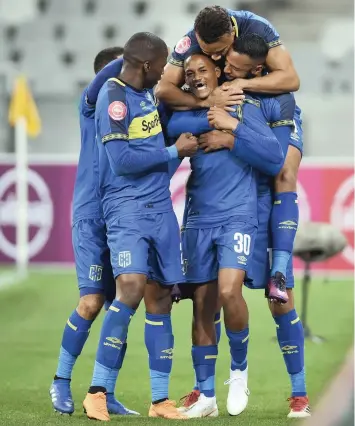  ??  ?? PERFECT BIRTHDAY PRESENT: Cape Town City players celebrate Craig Martin’s goal against SuperSport at Cape Town Stadium on Saturday.