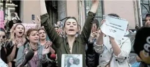  ?? /MURAD SEZER ?? Nasibe Samsaei, an Iranian woman living in Turkey, cut her hair during a protest outside the Iranian consulate in Istanbul.