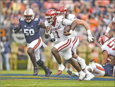  ?? Hank Layton/NWA Democrat-Gazette ?? On the move: Arkansas quarterbac­k KJ Jefferson (1) carries the ball, Saturday, Oct. 29, 2022, during the second quarter of the Razorbacks’ 41-27 win over the Auburn Tigers at Jordan-Hare Stadium in Auburn, Ala.