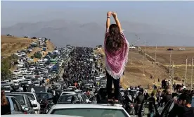  ?? Photograph: UGC/AFP/Getty Images ?? People gathering to mark 40 days since the death of Mahsa Amini in Saqez, Iran, 26 October 2022.