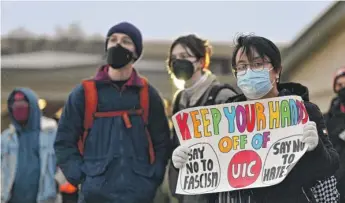  ?? VICTOR HILITSKI/FOR THE SUN-TIMES ?? UIC students on Thursday demonstrat­e outside the event organized by a student-led chapter of the conservati­ve group Turning Point USA.