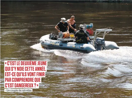  ?? PHOTO COLLABORAT­ION SPÉCIALE, STÉPHANE SINCLAIR ?? Des plongeurs de la Sûreté du Québec ont ratissé la rivière Rouge une bonne partie de la journée hier afin de retrouver un jeune.